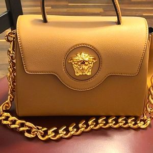Woman versace hand bag